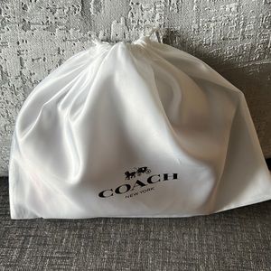 Brand New Coach turn key pouch.